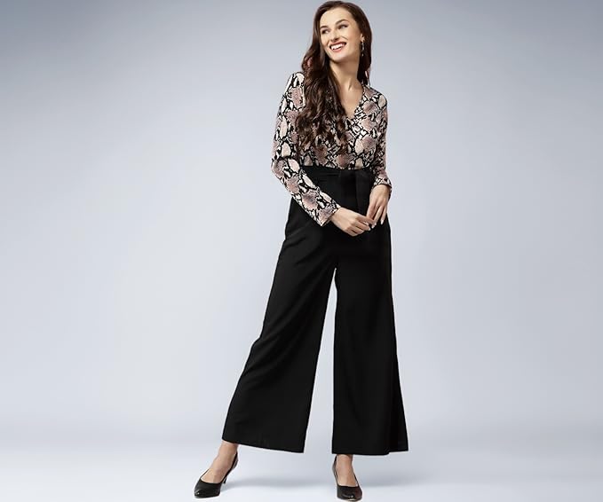 Woman wearing LONDON BELLY printed summer jumpsuit under ₹800
